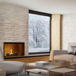 Element4 Bio 50i with Real Flame Burner with True-to-Nature Wood Logs installed at the living room near woods view
