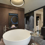 Element4 Sky M F Installed in the Bathroom with Real Flame Burner with True-to-Nature Cleaved Wood Logs